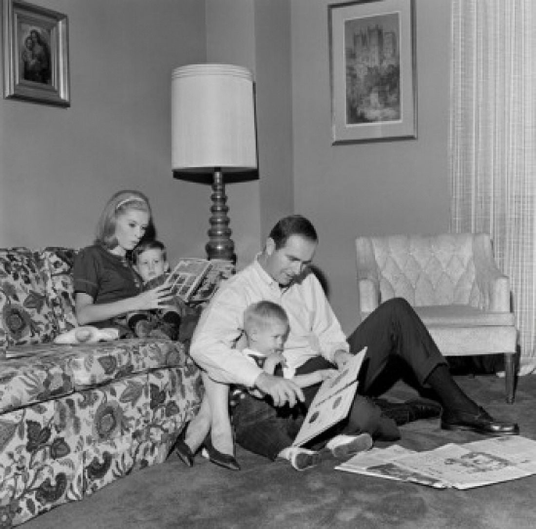 Family with two children in living room Canvas Art - (24 x 36)