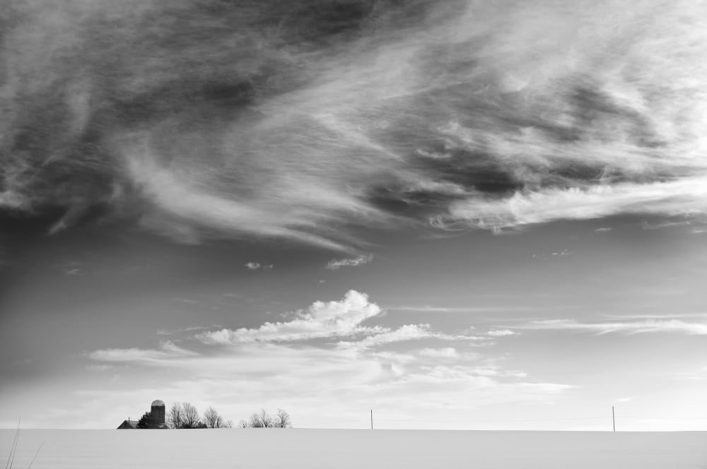 Farm In The Distance In A Snowy Field Maricourt Quebec Canada Canvas Art - Patrick La Roque Design Pics (34 x 22)