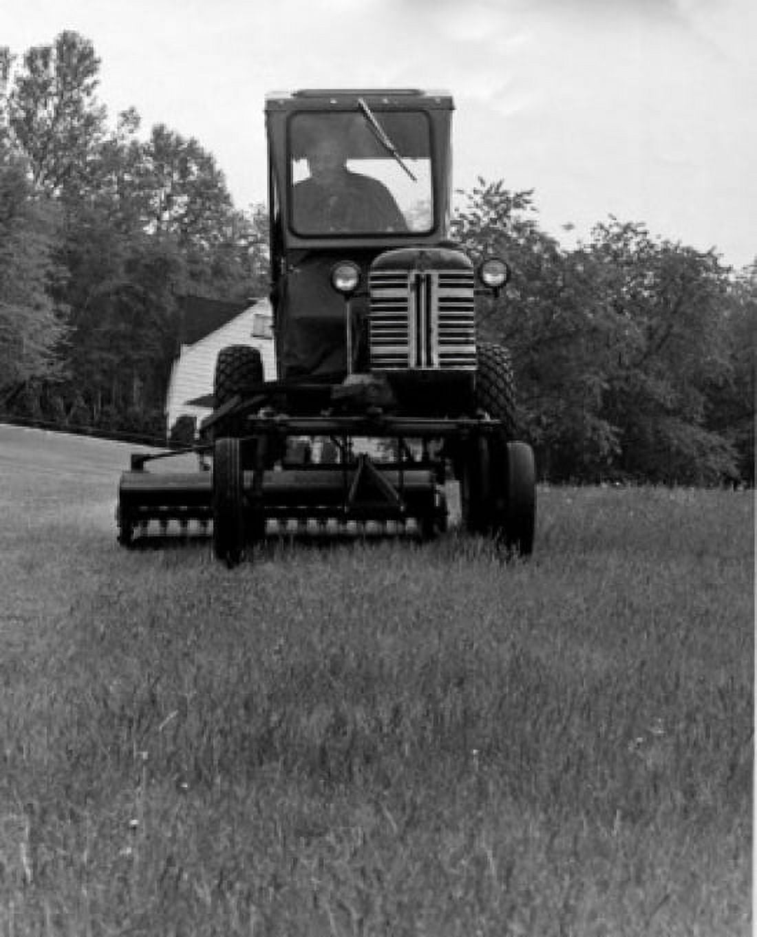 Farmer driving a tractor in a field Canvas Art - (18 x 24)