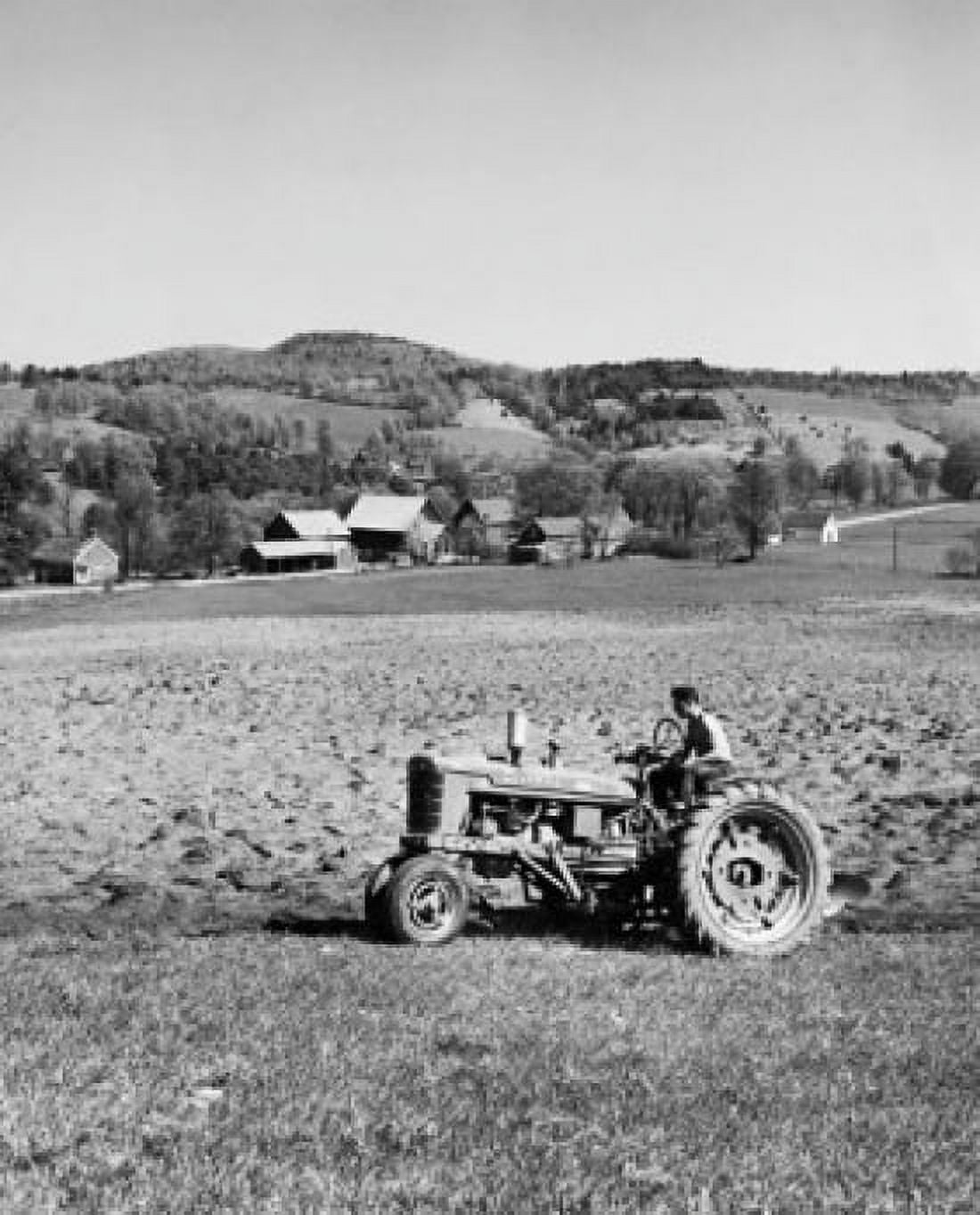 Farmer plowing a field with a tractor Hartford Vermont USA Canvas Art - (18 x 24)