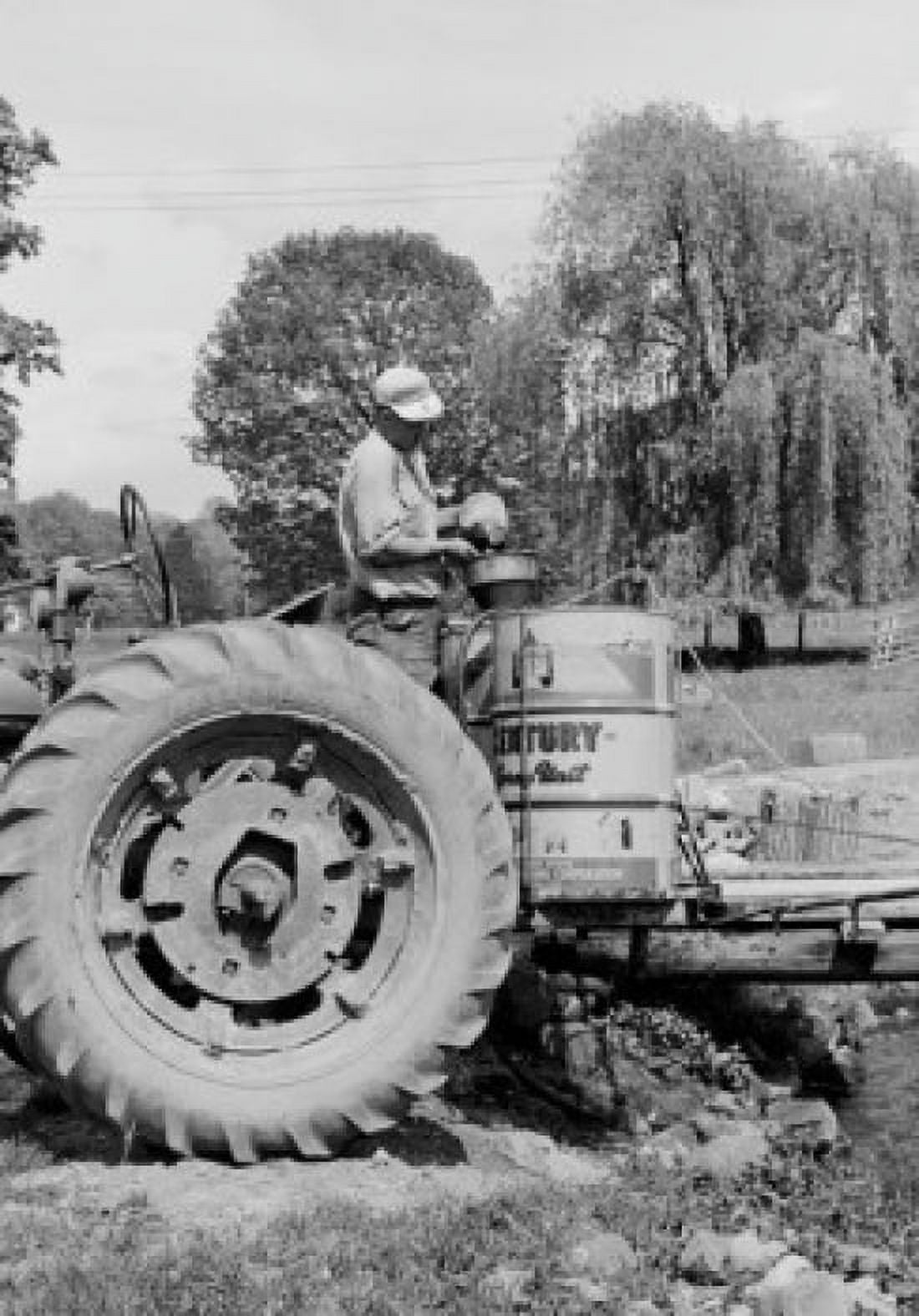Farmer using crop sprayer Canvas Art - (18 x 24)