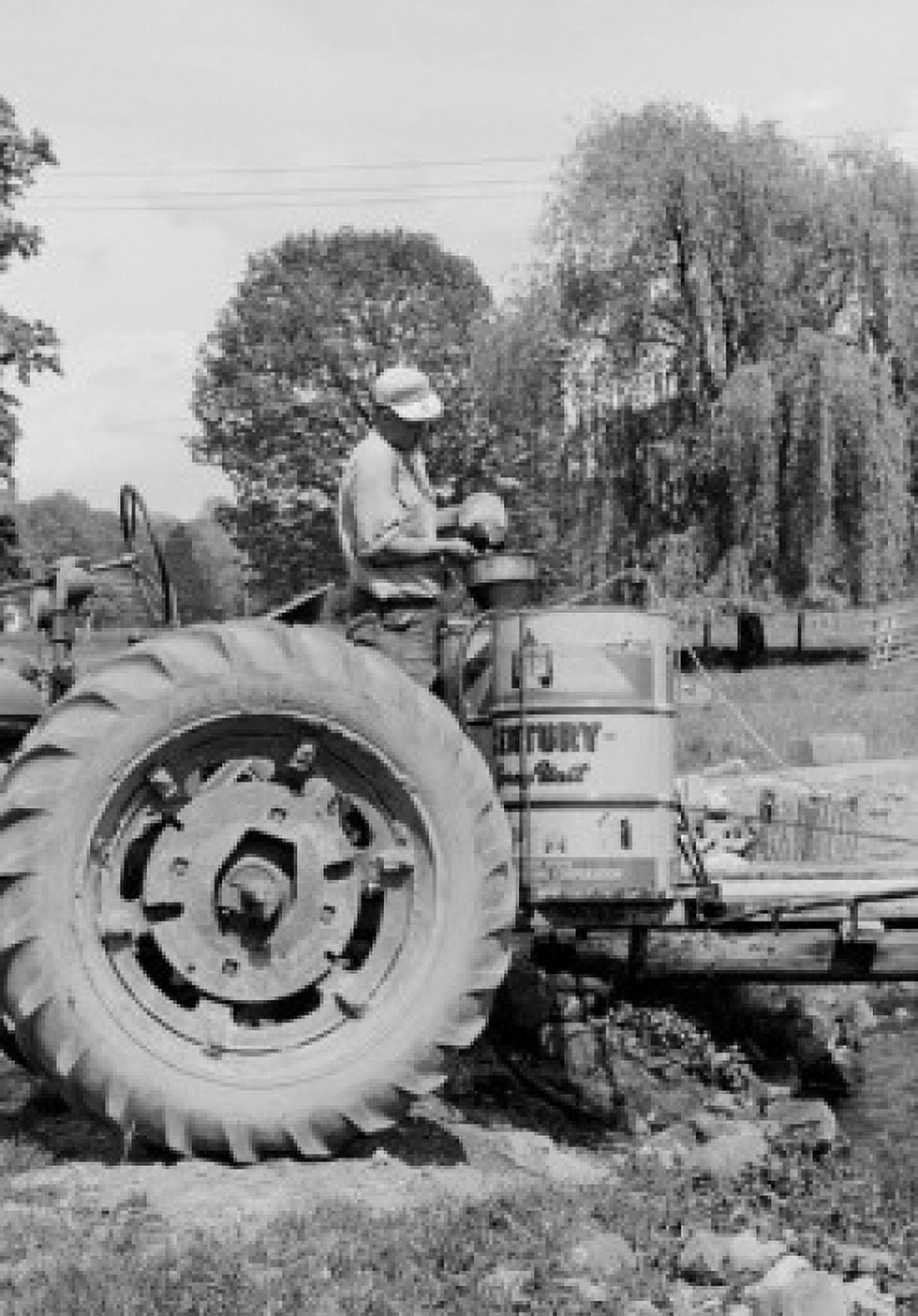 Farmer using crop sprayer Canvas Art - (24 x 36)