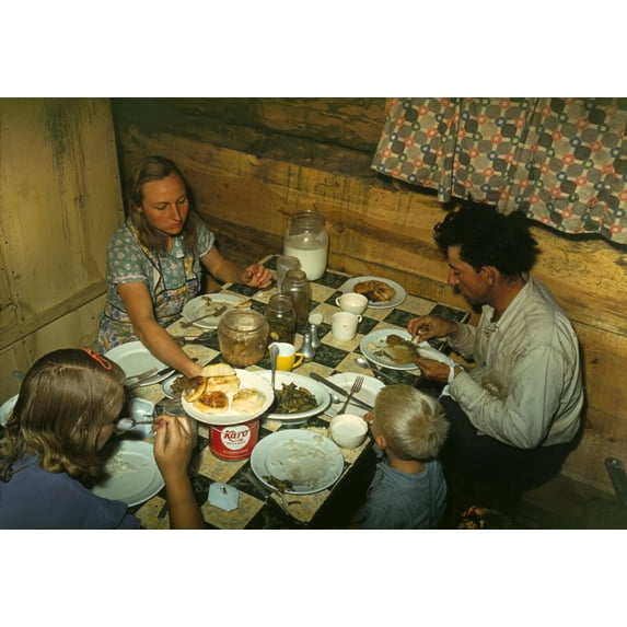 Faro Caudill'S Family Dinner In Their Dugout Home In Pie Town New Mexico. They Were Among 250 Homesteaders Families Who Migrated From The Dust Bowl. They Live In A Dugout With Rough Wood Planks Lining