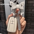thumbnail image 1 of Fashion TPU Car Key Case Full Cover Shell For Toyota Corolla Camry RAV4 Prius CHR C-HR Land Cruiser Prado Bowknot Keychain, 1 of 12