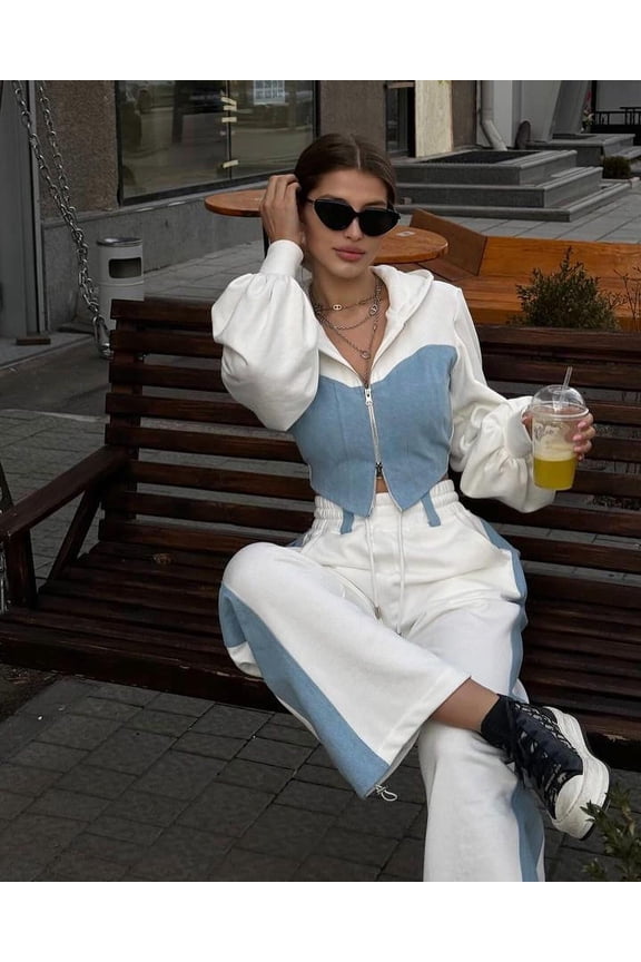 Fashionable and casual two-piece set of denim patchwork hooded top and trousers for women.