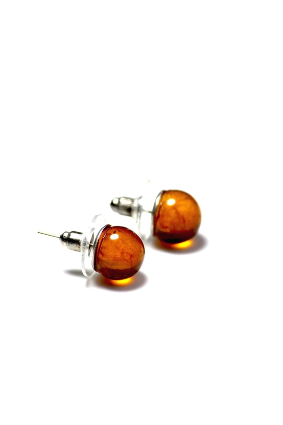 Fashionable handmade stud earrings with amber ball
