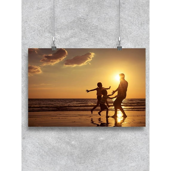 Father And Children On The Beach Poster -Image by Shutterstock