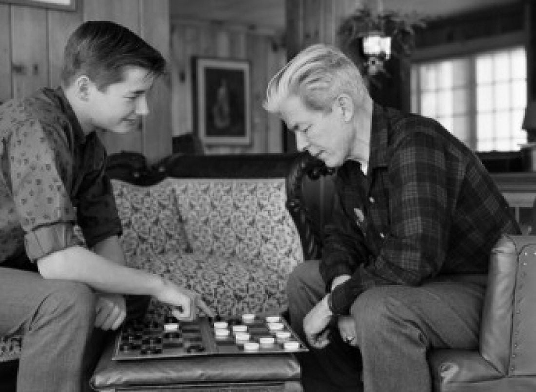 Father and his son playing checkers Canvas Art - (24 x 36)