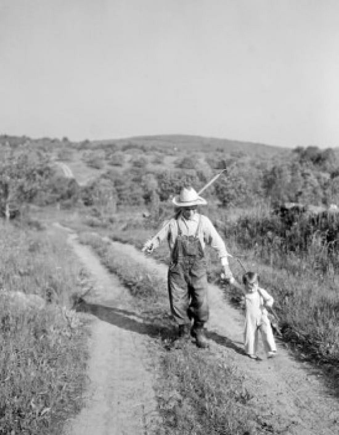 Father and son walking through footpath Canvas Art - (18 x 24)