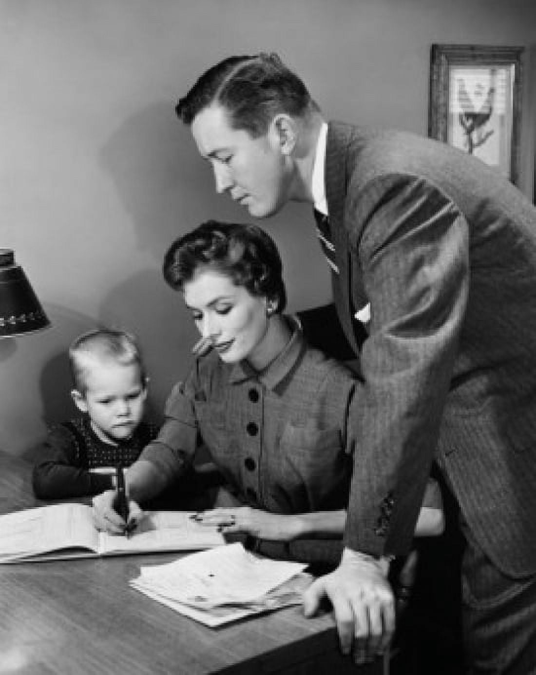 Father and son watching mother writing in a notebook Canvas Art - (18 x 24)