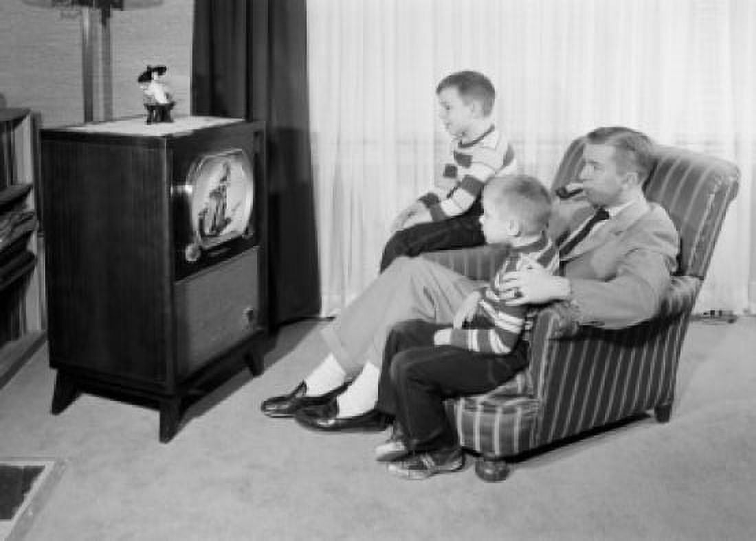 Father and two sons watching television Canvas Art - (24 x 36)