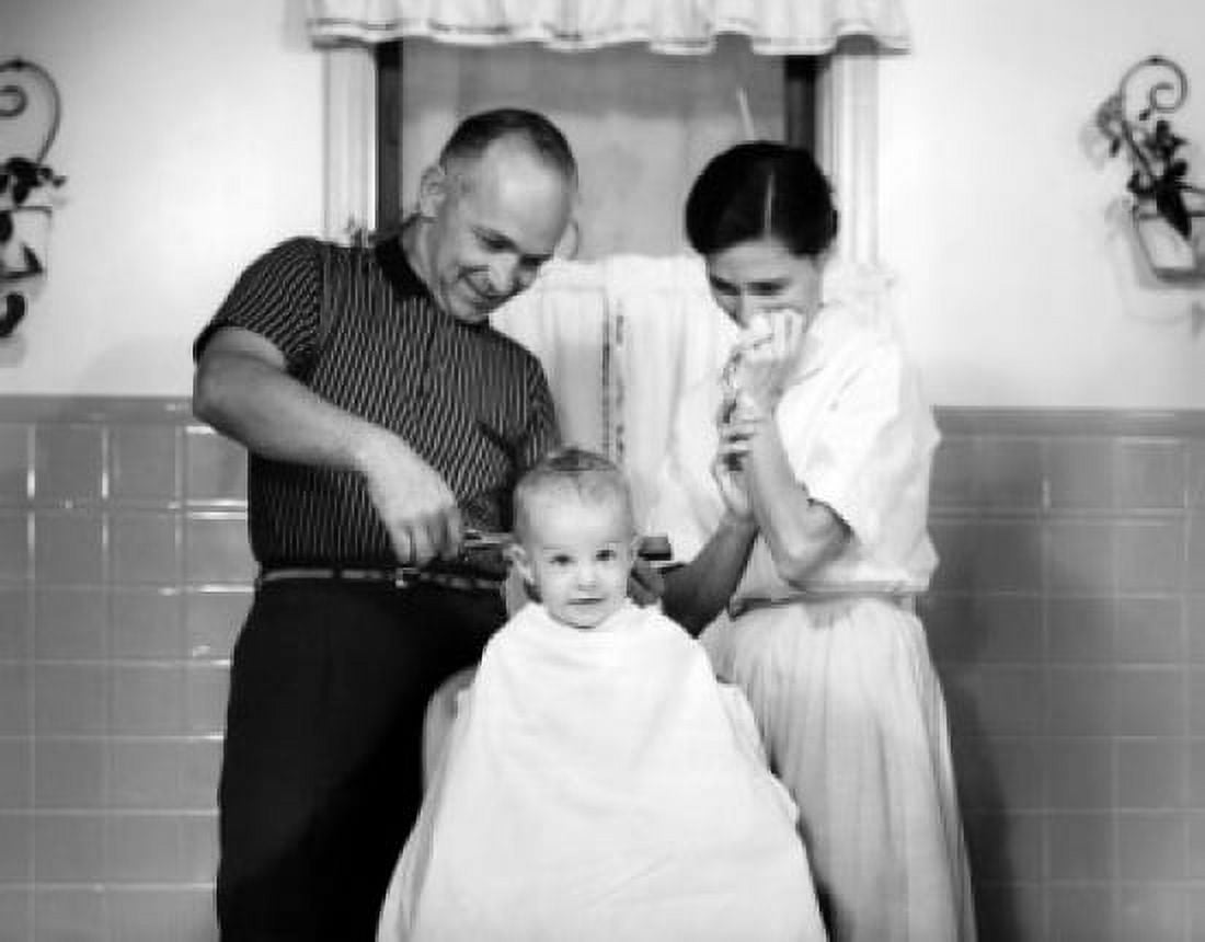Father cutting sons hair while mother watching Canvas Art - (18 x 24)