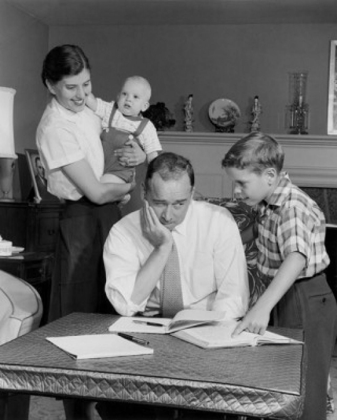 Father helping son with his homework Canvas Art - (18 x 24)