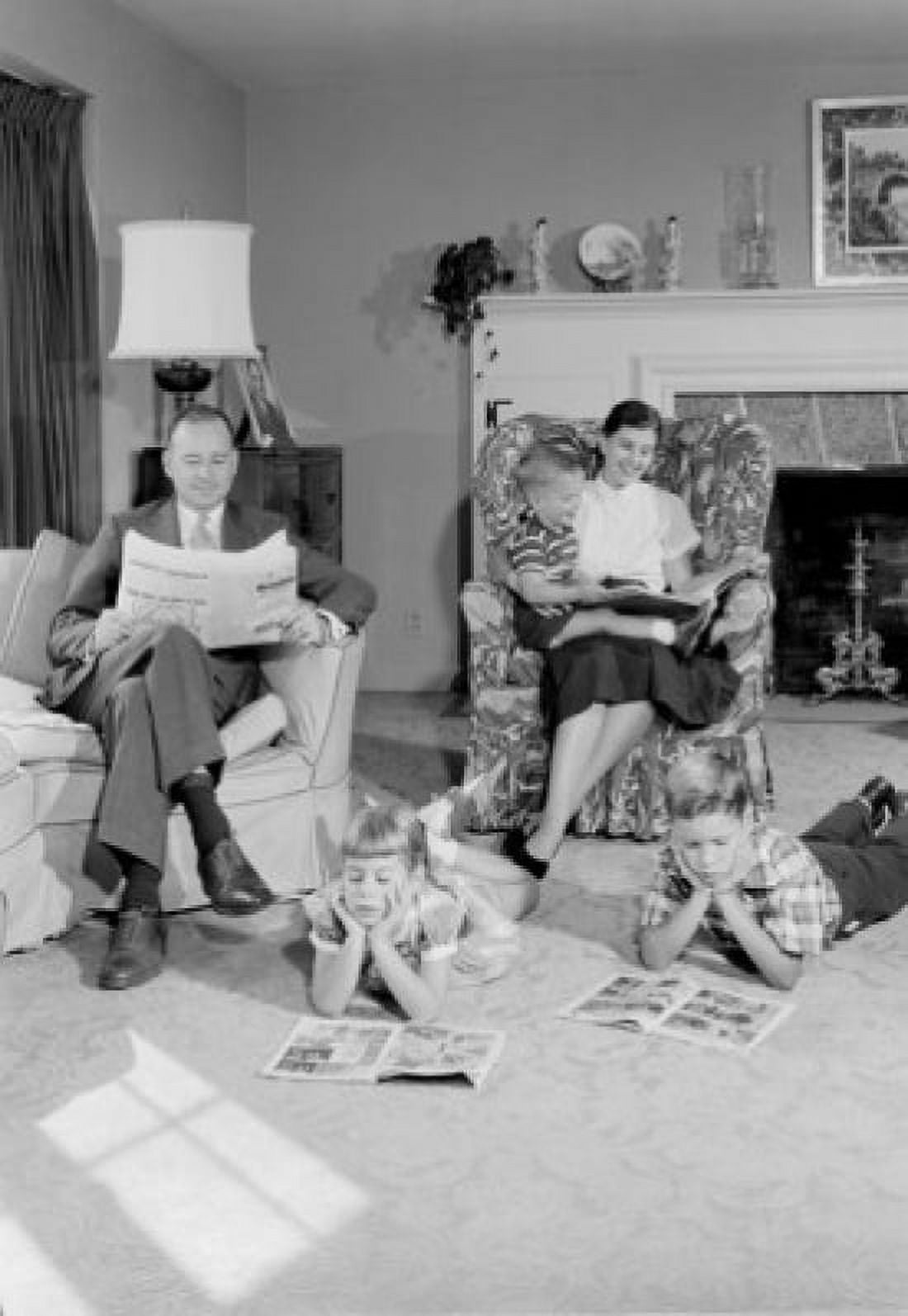 Father mother and three children reading in living room Canvas Art - (18 x 24)