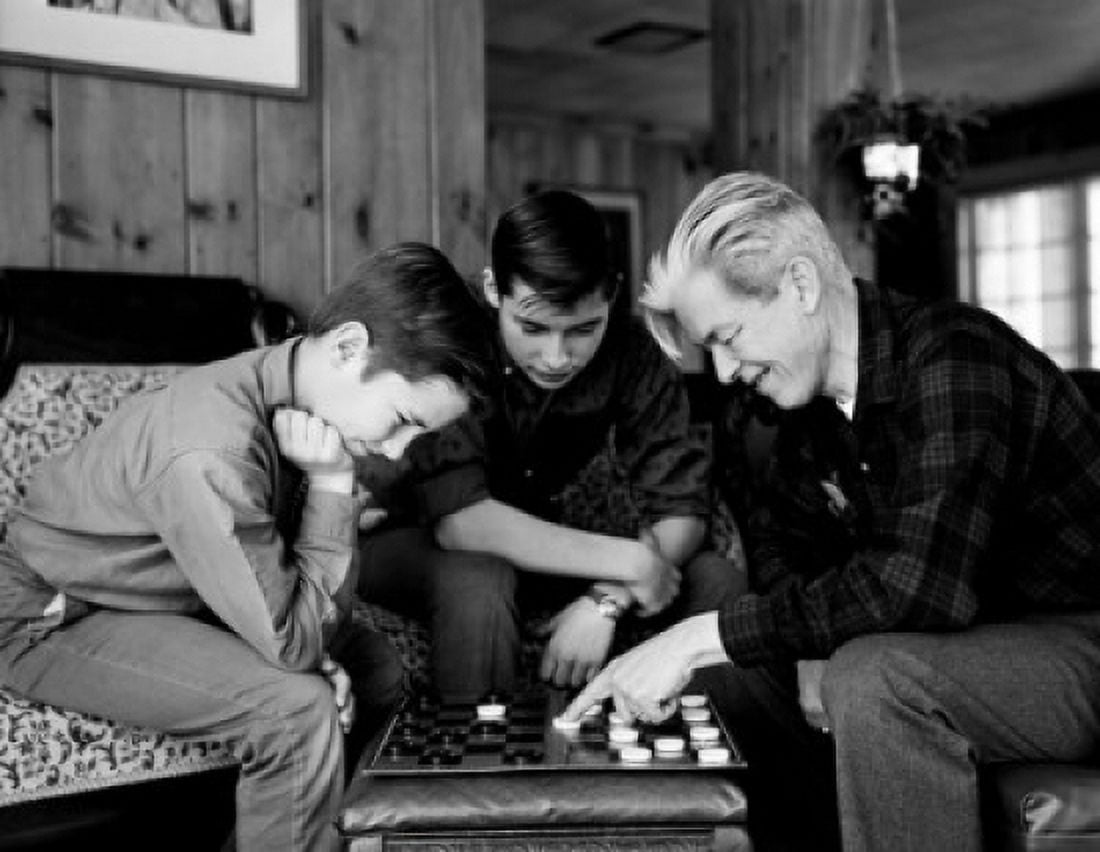 Father playing draughts with sons Canvas Art - (24 x 36)
