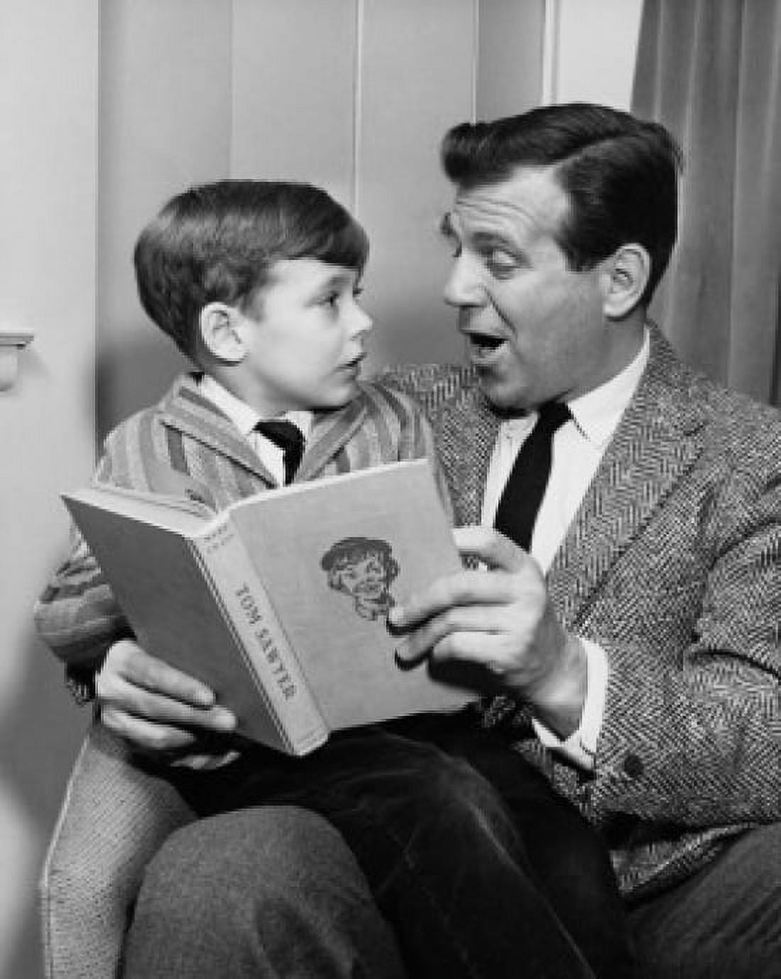 Father reading a story to his son Canvas Art - (24 x 36)