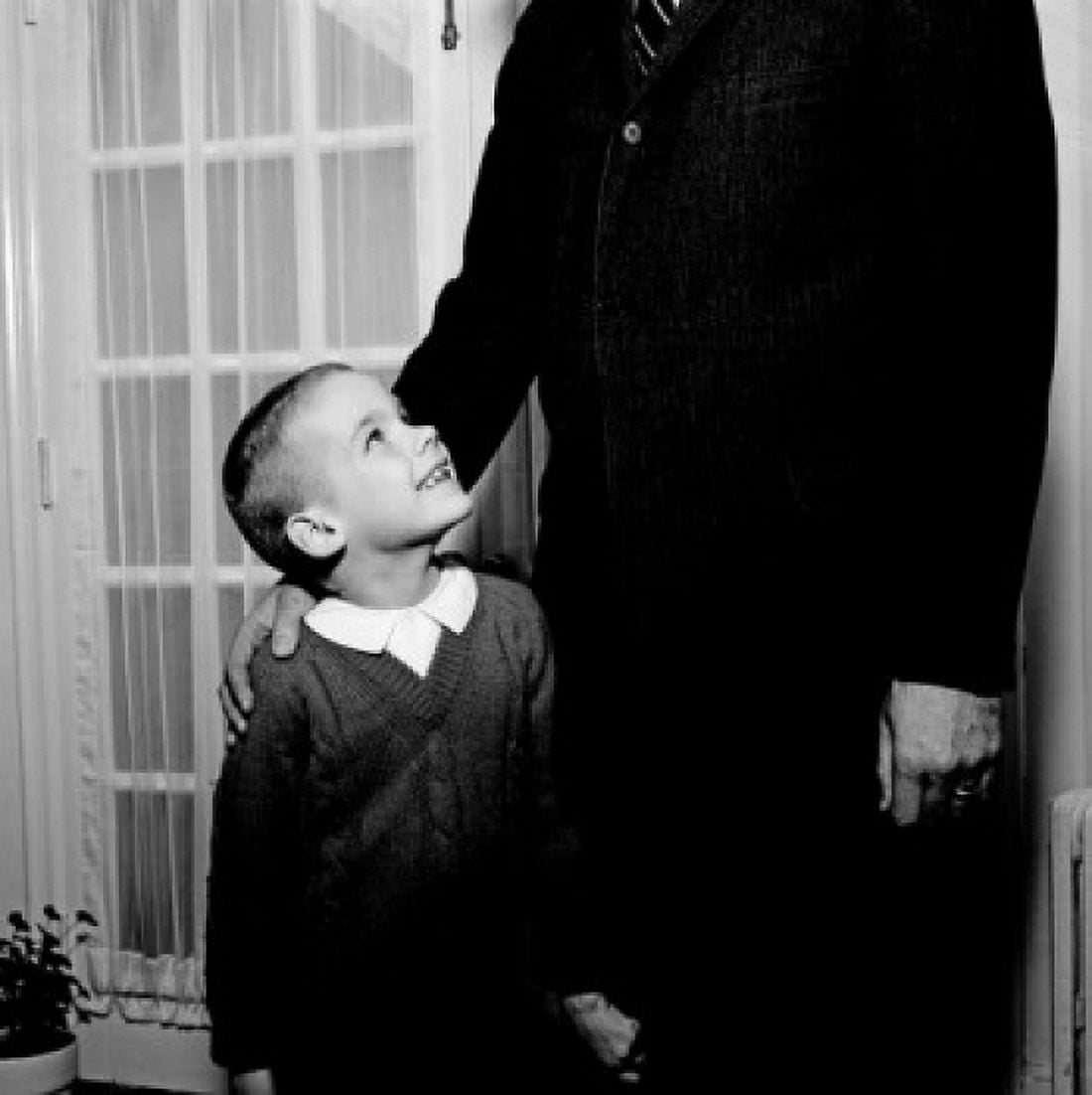 Father standing with son Canvas Art - (18 x 24)