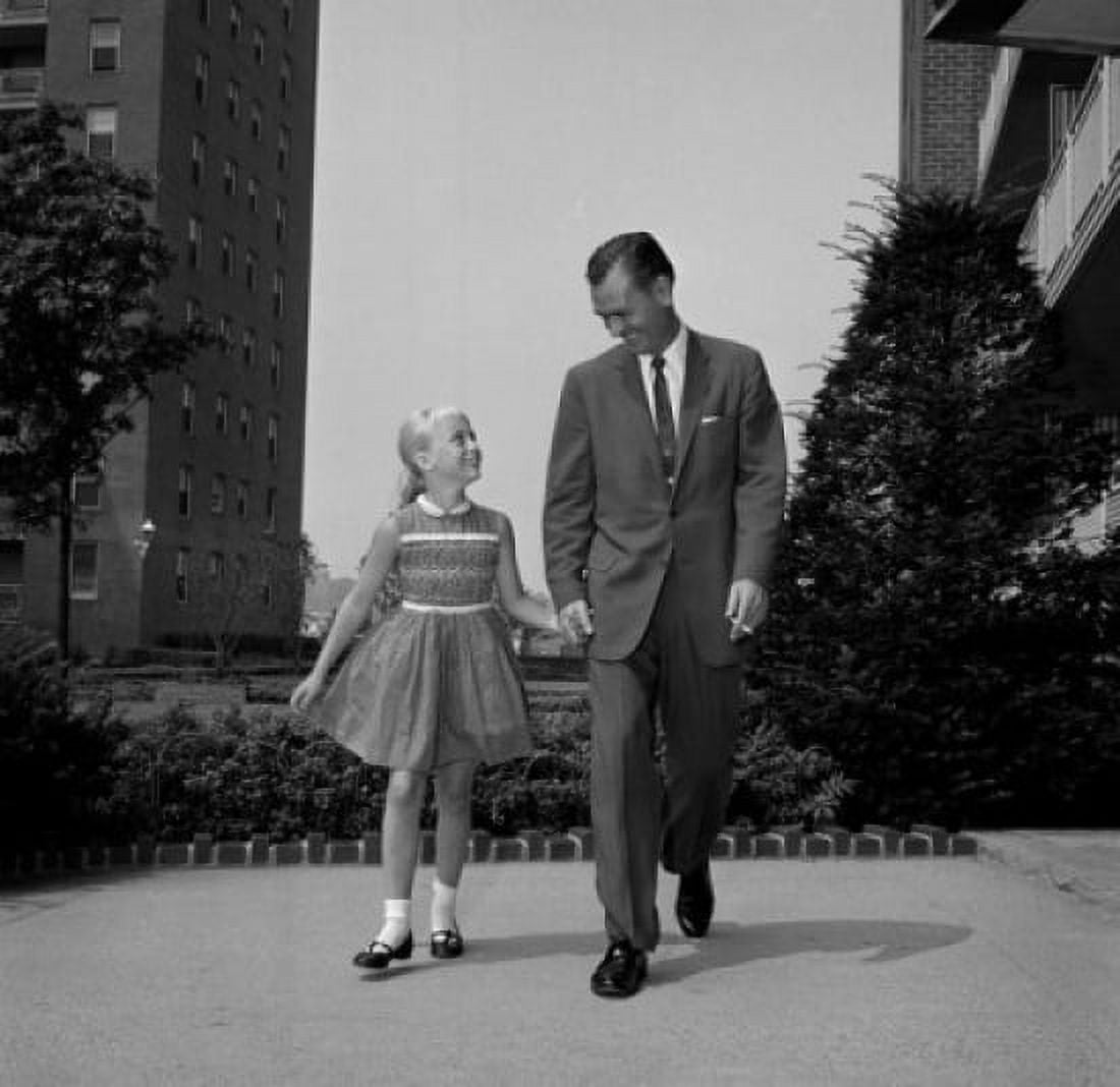 Father walking hand in hand with daughter Canvas Art - (18 x 24)