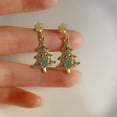 thumbnail image 1 of Faty-T Bohemian Christmas Tree Earrings with Rhinestones & Acrylic Bow Design - 3-Color Layered Holiday Party Jewelry in White, Green, Pink for Festive Outfits, 1 of 10