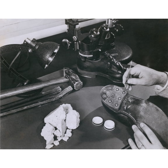 Fbi Forensic Science. A Technician Removing Safe Insulation From The Shoes Of A Burglary Suspect At The Fbi Lab In 1954.