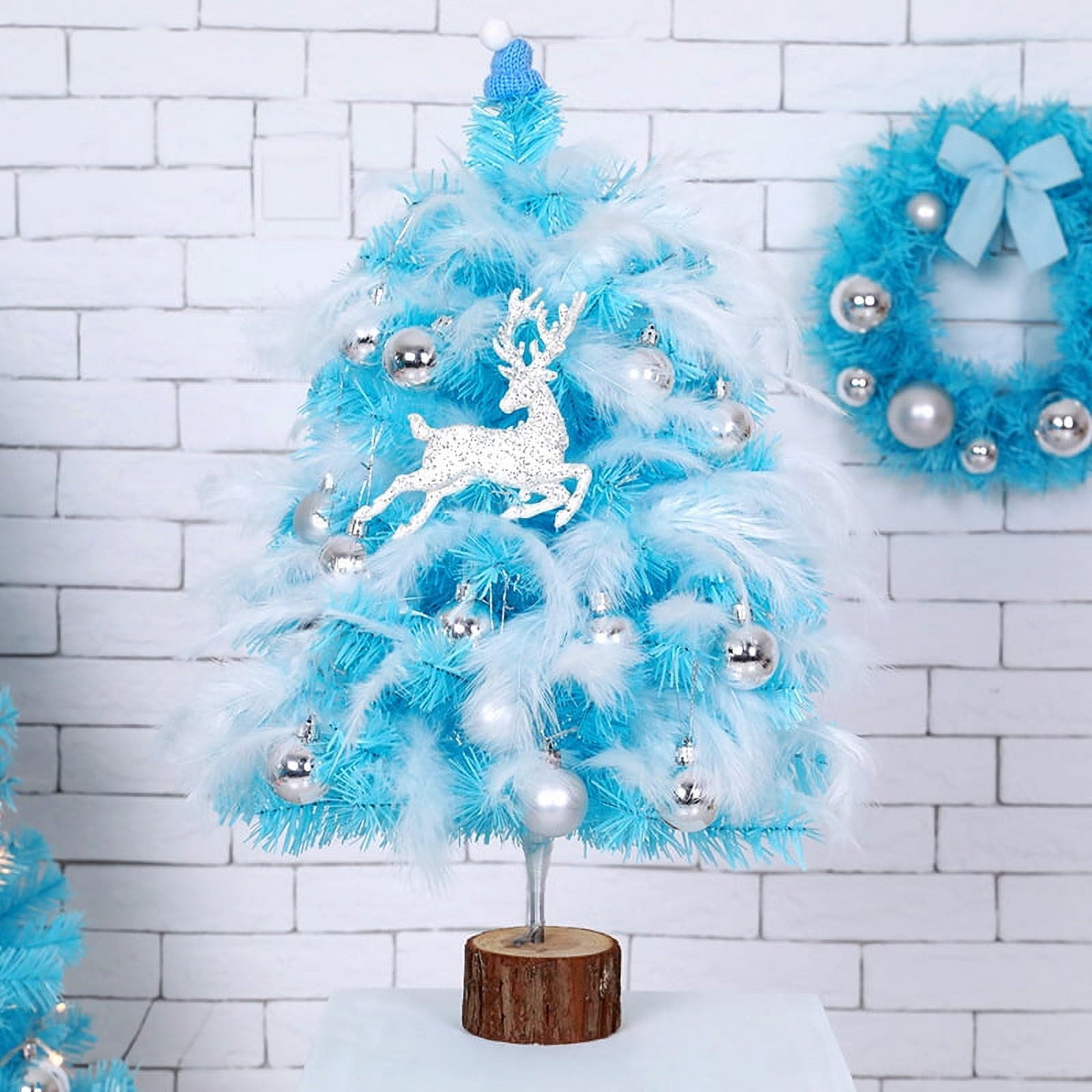 Blue decorated tree with feathers.