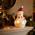 thumbnail image 1 of Feledorashia Lighted Ceramic Figurine, Christmas Tabletop Decoration, Holiday Character Accent for Mantels Shelves and Windowsills, Ceramic Construction with LED Light Details and Stable Base, 1 of 6