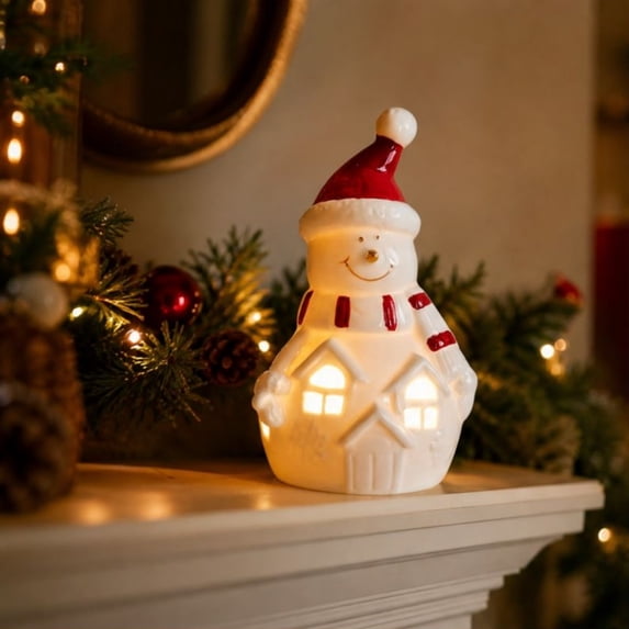 Feledorashia Lighted Ceramic Figurine, Christmas Tabletop Decoration, Holiday Character Accent for Mantels Shelves and Windowsills, Ceramic Construction with LED Light Details and Stable Base