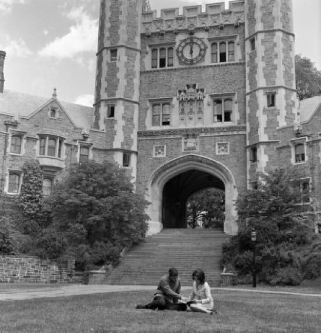 Female and male students sitting on lawn in front of university building Boston USA Canvas Art -  (18 x 24)
