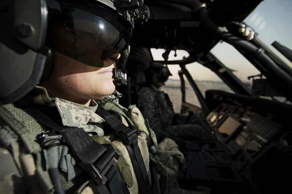 Female pilot commander in the cockpit of a UH-60L Blackhawk Canvas Art - Terry MooreStocktrek Images (35 x 24)