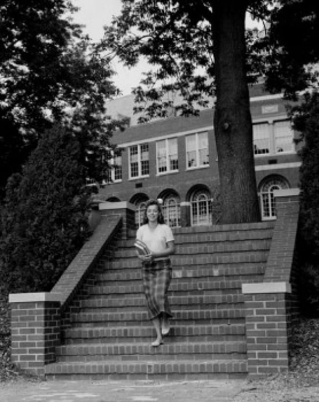 Female students walking down steps Canvas Art - (18 x 24)