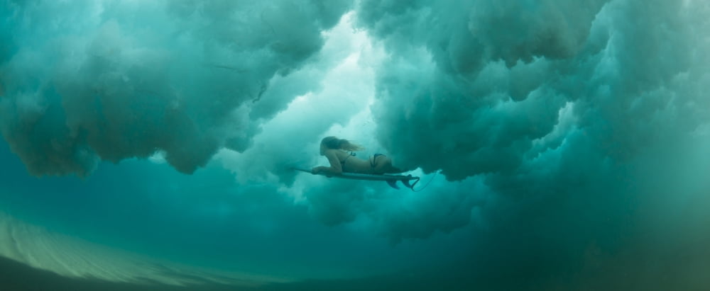 Female surfer pushes under a wave while surfing Clansthal South Africa Canvas Art - Panoramic Images (36 x 12)