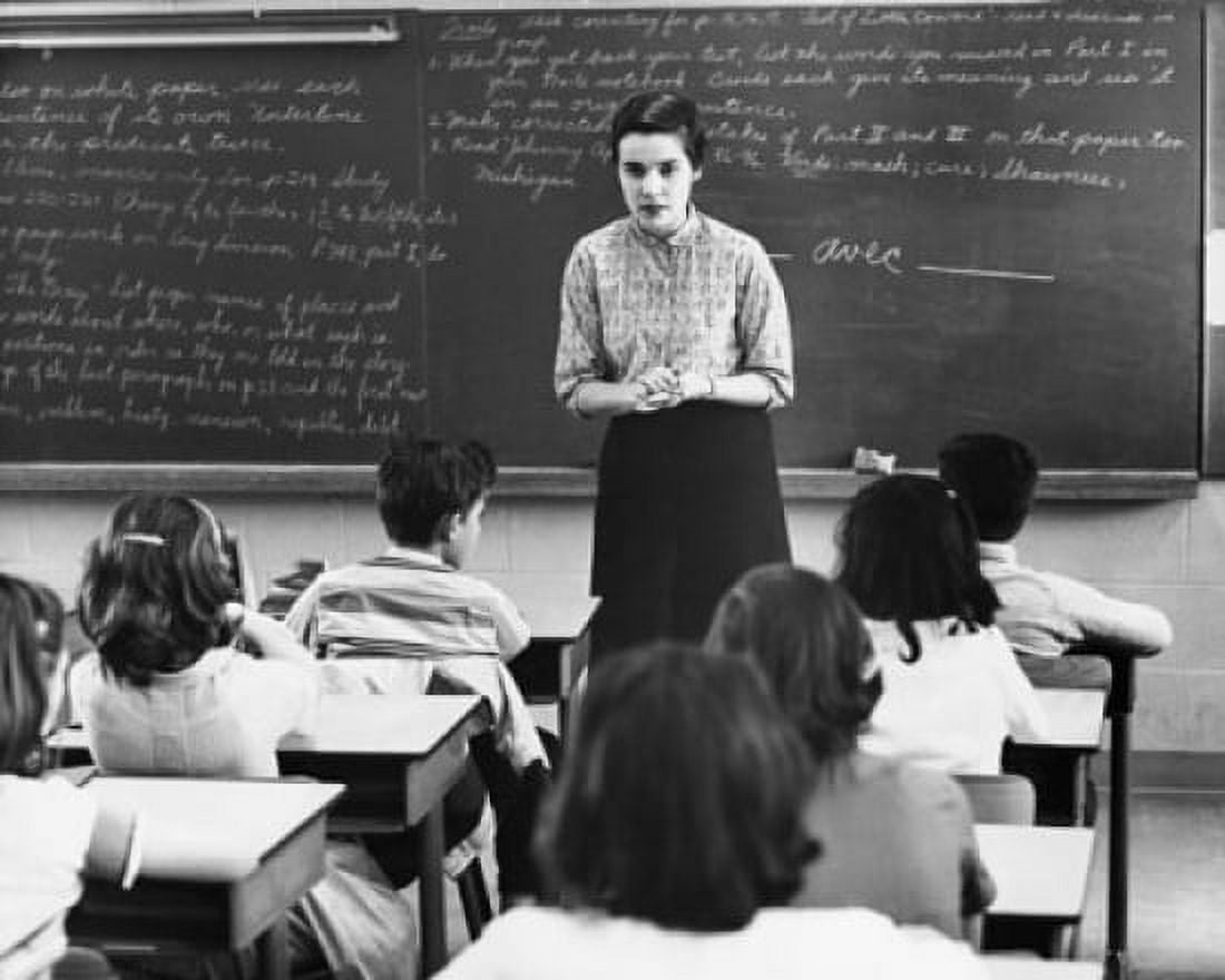 Female teacher teaching students in a classroom Canvas Art - (18 x 24)