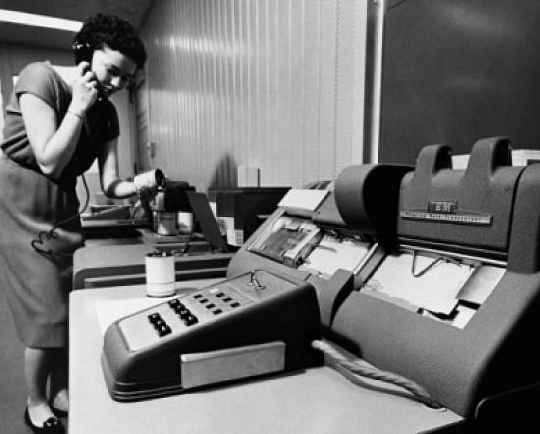 Female transceiver operator preparing punch cards from transmitted data Canvas Art - (24 x 36)