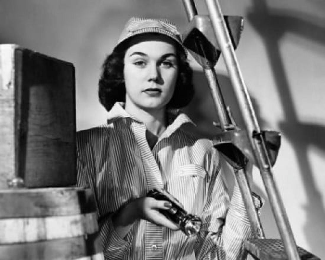 Female worker holding a flashlight Canvas Art - (18 x 24)