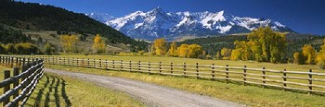 Fence along a road Sneffels Range Colorado USA Canvas Art - Panoramic Images (18 x 6)
