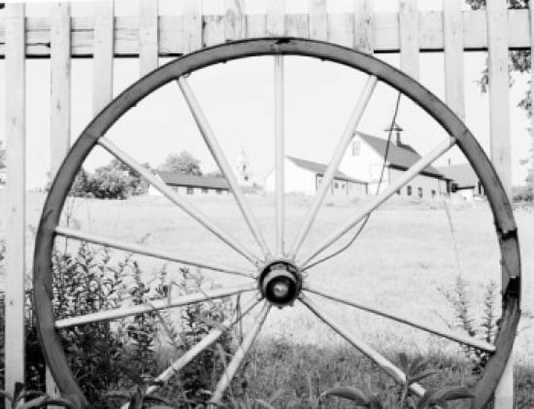 Fence made from old wagon wheel Canvas Art - (18 x 24)