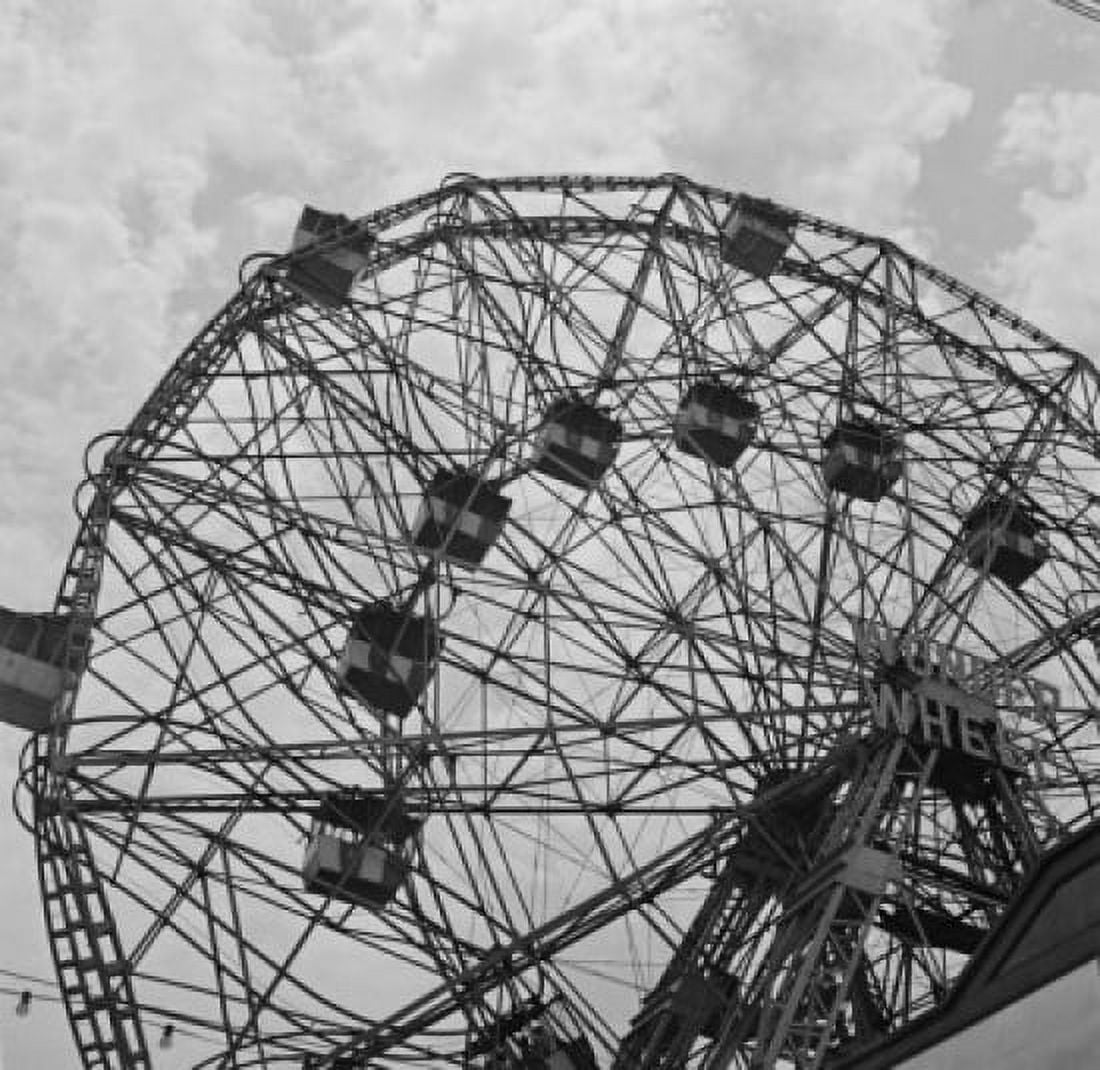 Ferris wheel against cloudy sky Canvas Art - (24 x 36)