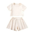 thumbnail image 1 of Fesfesfes Children's Casual 2 Piece Summer Outfits Short Sleeve Round Neck Button Top and Solid Color Elastic Waist Shorts,Matching Sets for Girls,School Beach Clothing(Beige,4 Years), 1 of 9