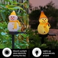 thumbnail image 1 of Festive Solar-Powered Snowman Floor Stake Lights for Christmas Decoration,Automatic Dusk to Dawn Sensor and Waterproof Design, Ideal for Gardens, Courtyards Orange, 1 of 4
