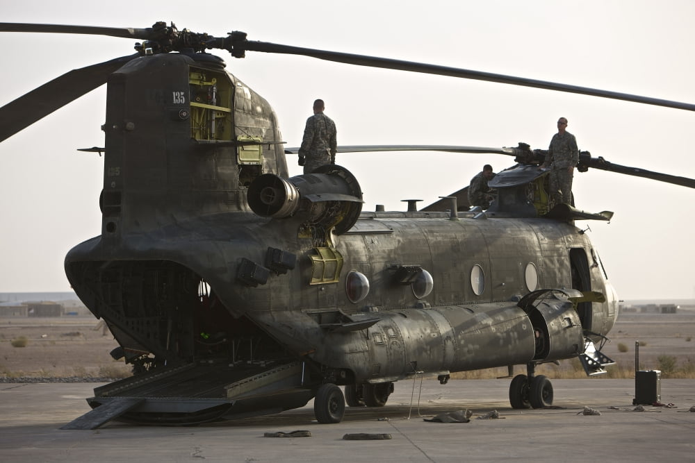 Field maintenance on a CH-47 Chinook Tikrit Iraq Canvas Art - Terry MooreStocktrek Images (35 x 23)