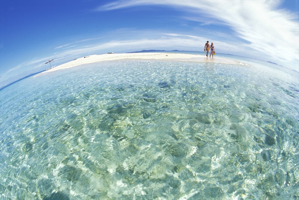 Fiji Couple On Small Private Island Hold Hands Blue Sky Turquoise Ocean Snorkel Gear Wide Angle View Canvas Art - Dave Fleetham Design Pics (38 x 24)