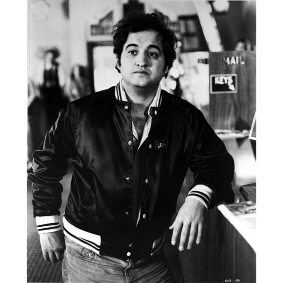 Film still featuring John Belushi wearing a bomber jacket Photo Print (24 x 30)