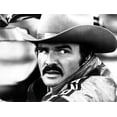 thumbnail image 1 of Film still of Burt Reynolds looking over his shoulder wearing a cowboy hat Photo Print (24 x 30), 1 of 1