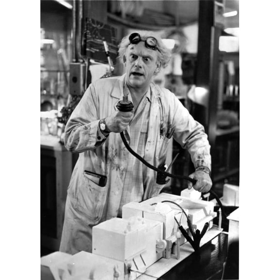 Film still of Christopher Lloyd wearing a lab coat Photo Print (8 x 10)