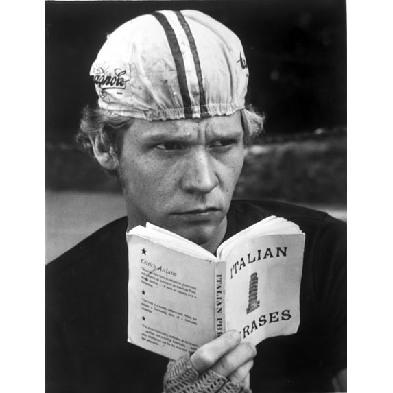 Film still of Dennis Christopher reading an Italian phrase book Photo Print (24 x 30)