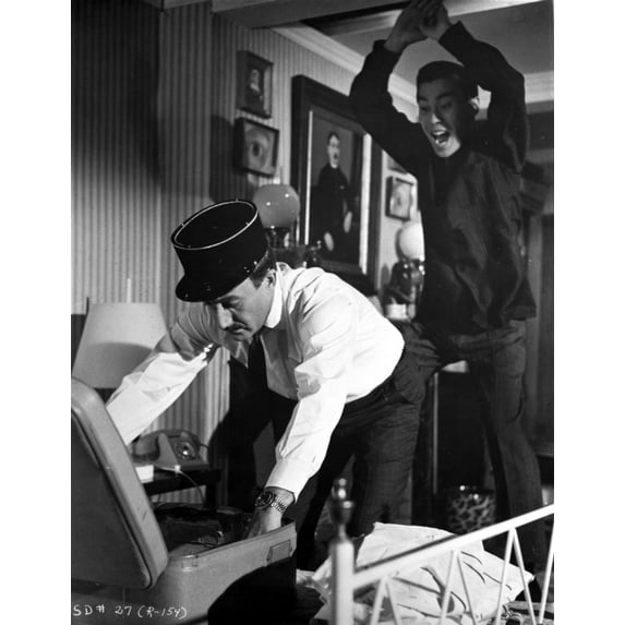 Film still of Peter Sellers as Inspector Clouseau with a man behind him Photo Print (8 x 10)
