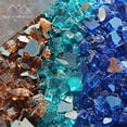 thumbnail image 1 of Fire Pit Glass - Aqua, Copper, Cobalt Blue Blend Reflective Fire Glass 1/2" - Reflective Fire Pit Glass Rocks - Blue Ridge Brand™ Reflective Glass for Fireplace and Landscaping, 1 of 6