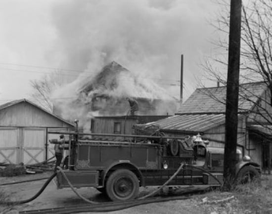 Fire engine next to home in fire Canvas Art - (18 x 24)
