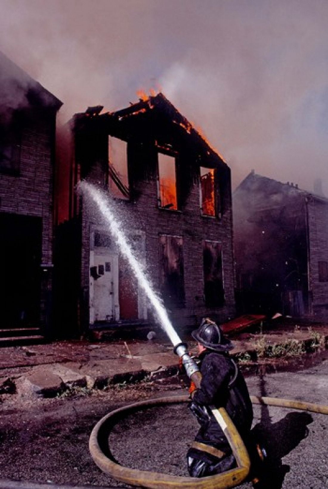 Firefighter during a rescue operation USA Canvas Art - Panoramic Images (25 x 36)