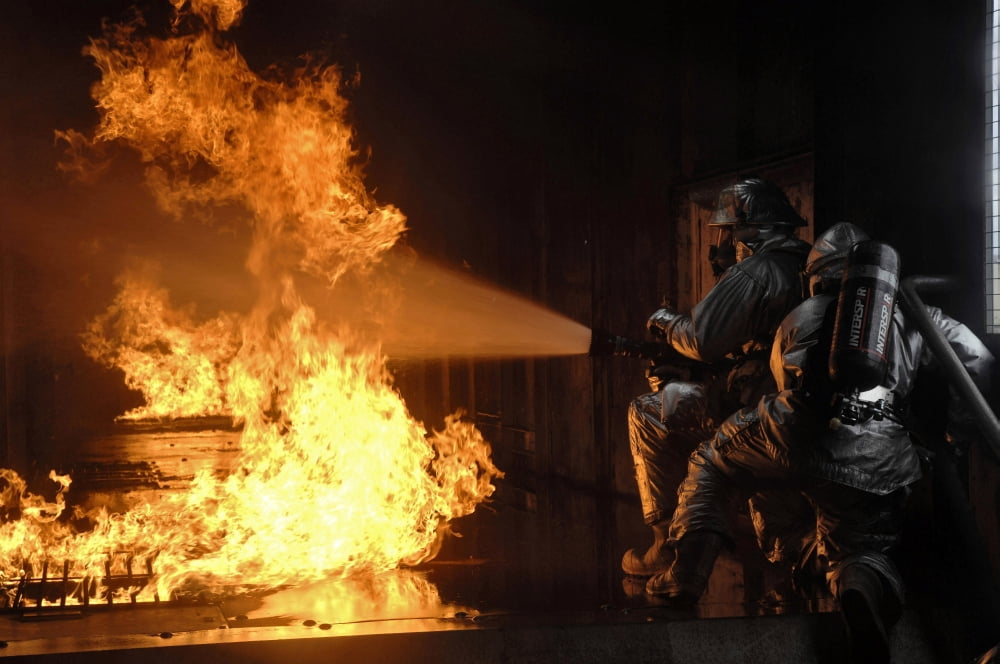 Firefighters extinguish a simulated battery fire Canvas Art - Stocktrek Images (34 x 23)
